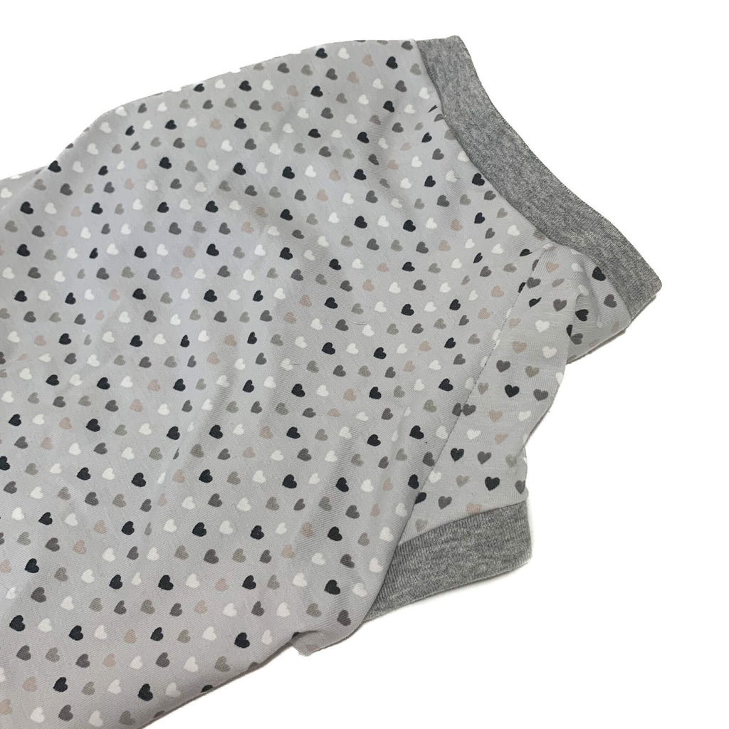 Hudson Houndstooth raglan dog tshirt in mini grey hearts print. Handmade from super soft upcycled fabric salvaged from the fashion industry and features heather grey rib trim at neckline and sleeve openings. The print is light grey with rows of tiny hearts in various shades of grey and white.